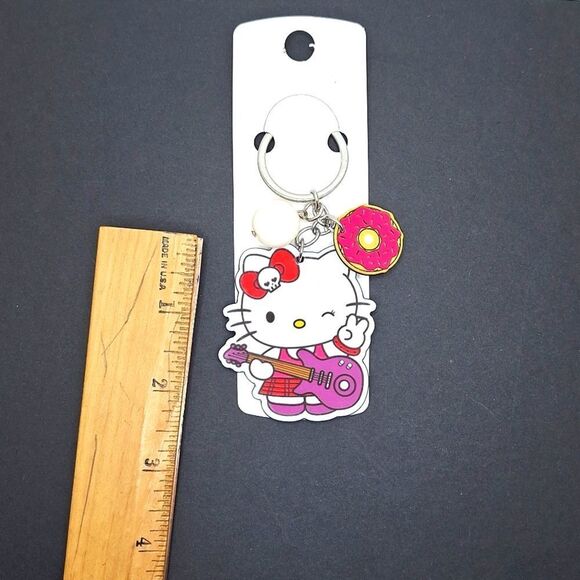 Guitar Hello Kitty winking dangle smiley flower sunshine acrylic accesso… - Picture 1 of 2